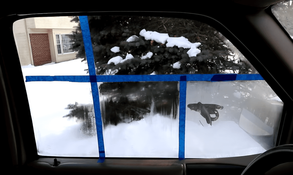 Man uses a piece of tape for the easiest way to defog windows for good