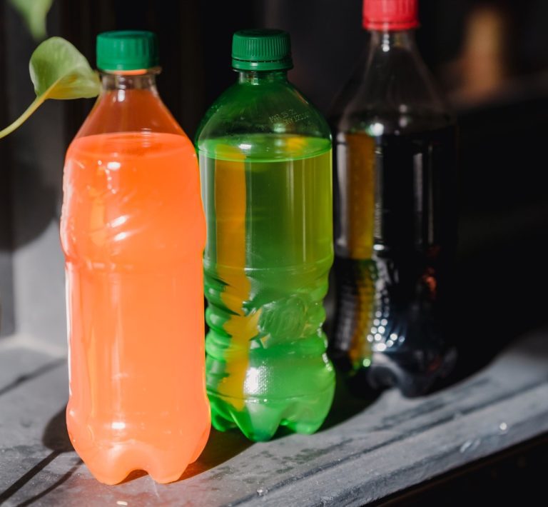 Crafter shows how to upcycle plastic soda bottles into flower