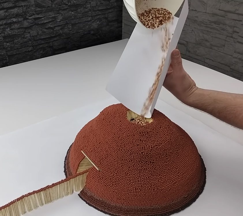 Man lights volcano made from matches and toilet paper roll and gets