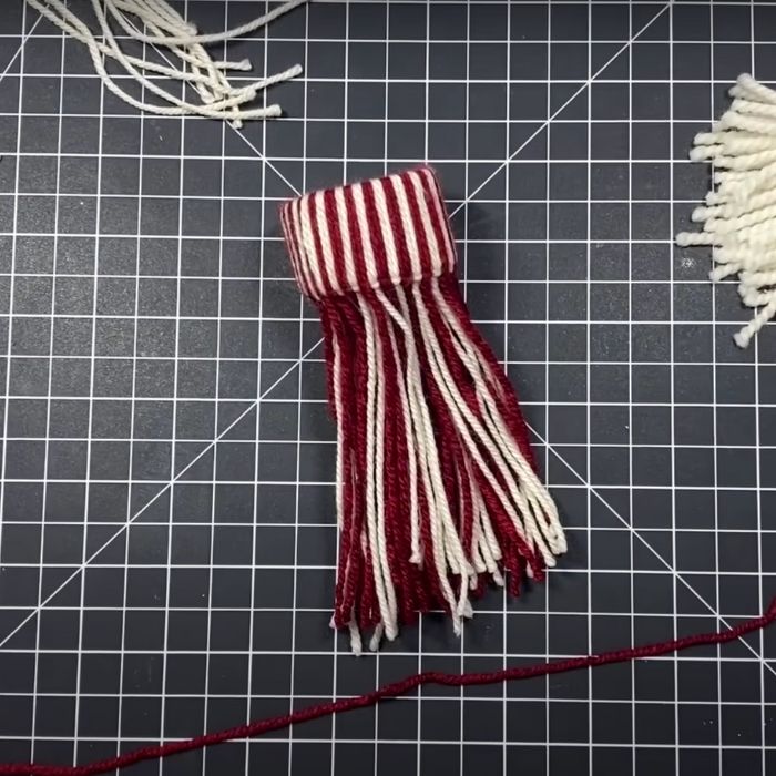 Make adorable gnome ornaments with yarn and cardboard