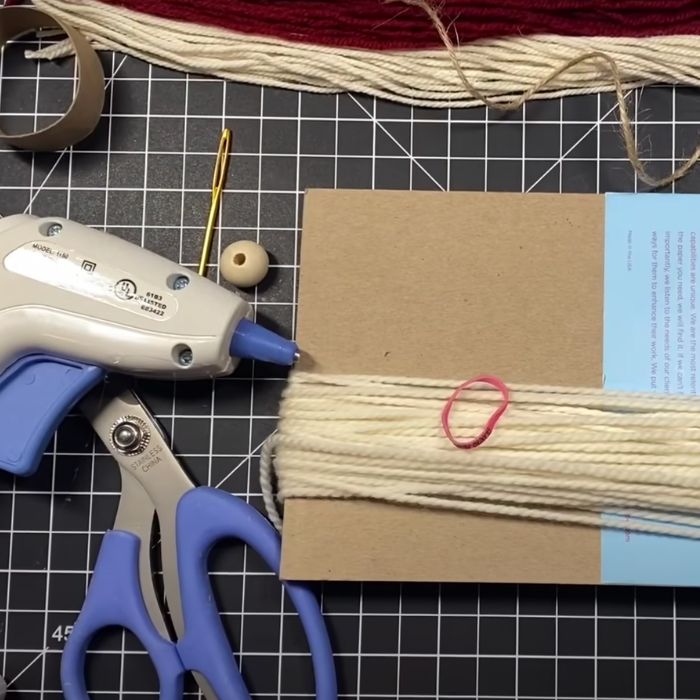 Make adorable gnome ornaments with yarn and cardboard