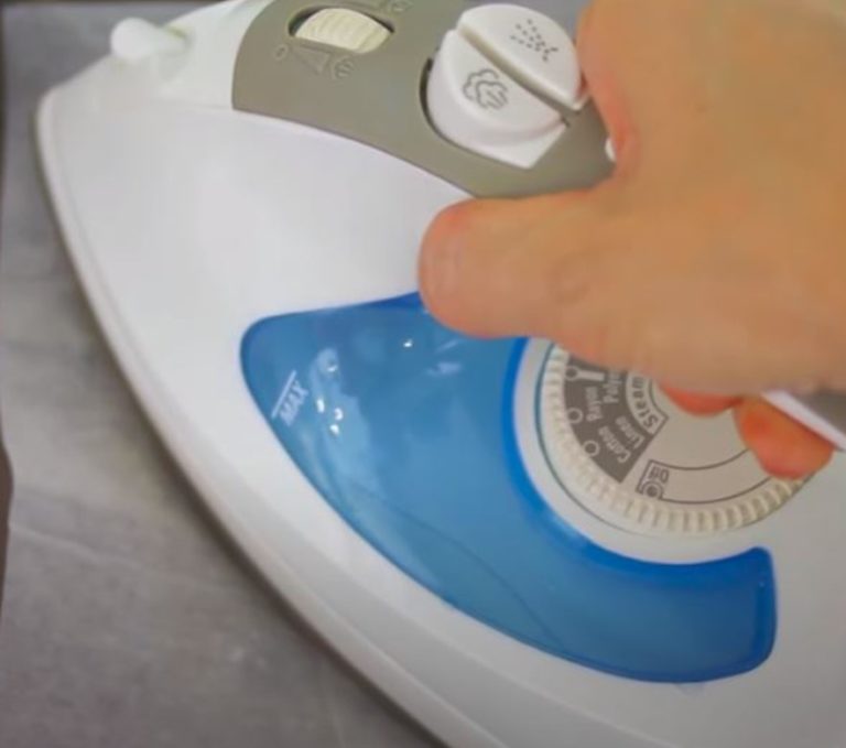 Homemaker shows simple way to repair holes in clothing without needle