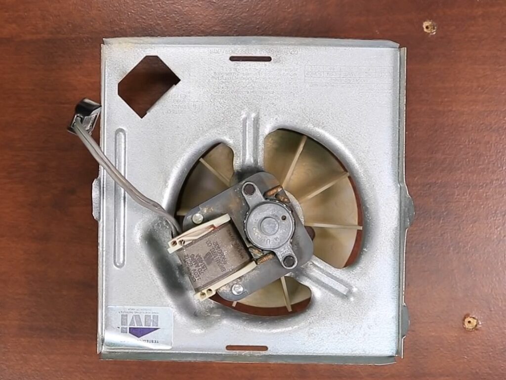 Home repairman shows how to replace bathroom fan in 5 minutes