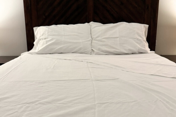 California Design Den sheets on bed